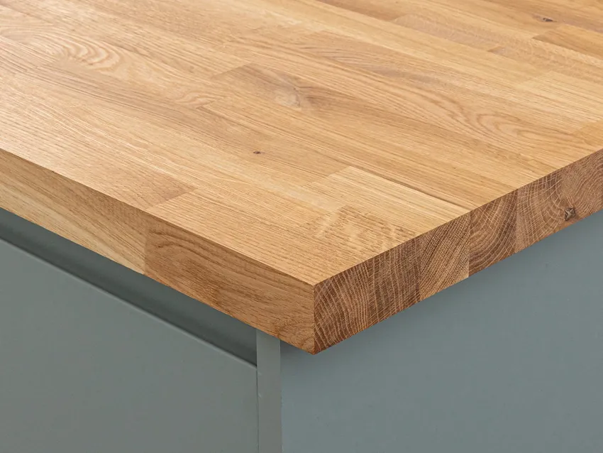 Solid oak worktop close-up showing the timber grain and edge